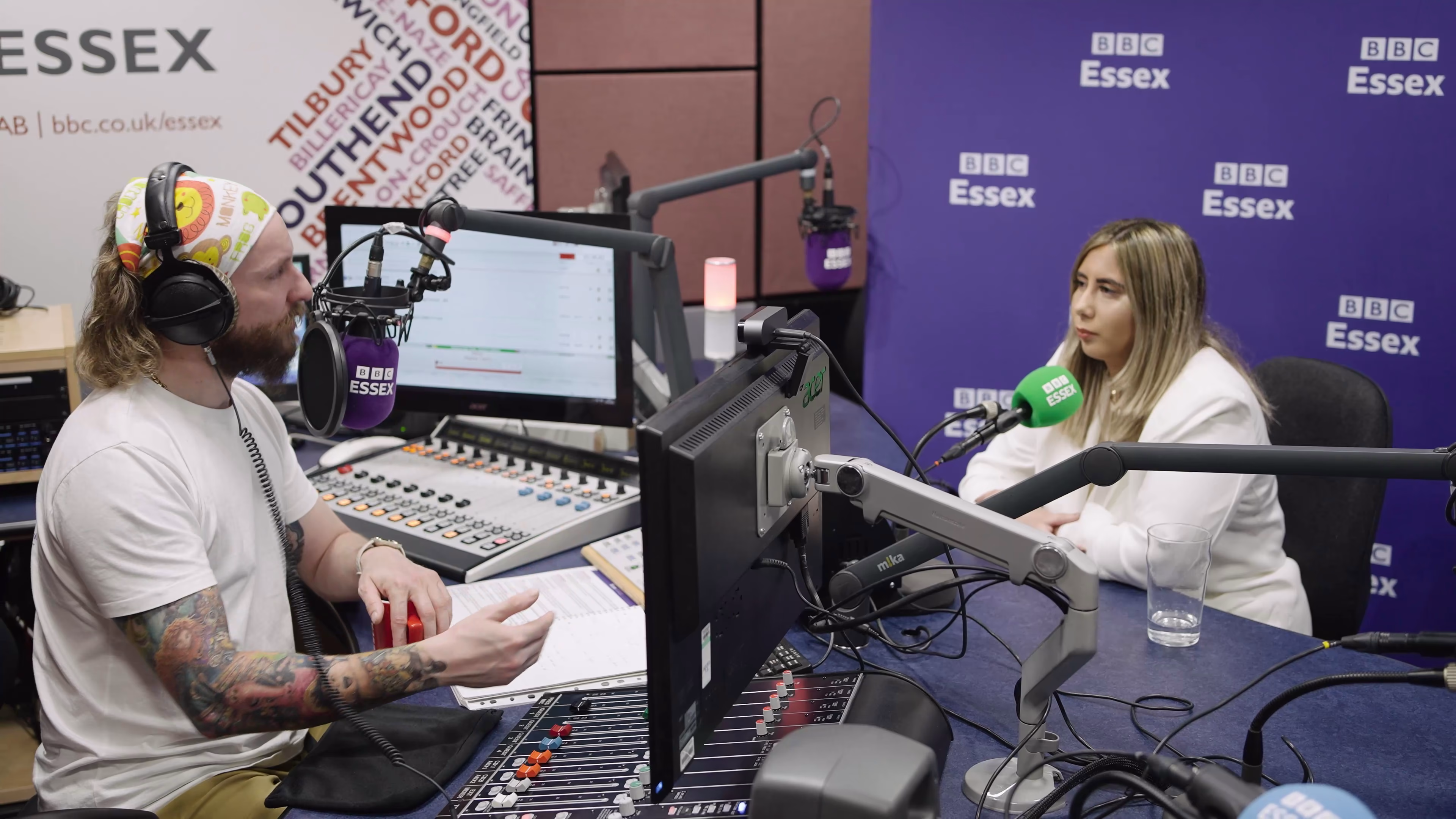 Conversation in progress in the radio studio